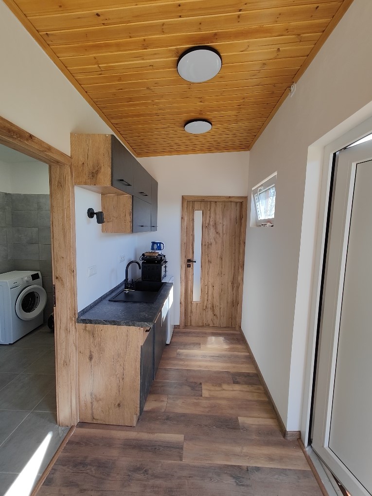 Kitchen and utility interior of the completed Tiny House